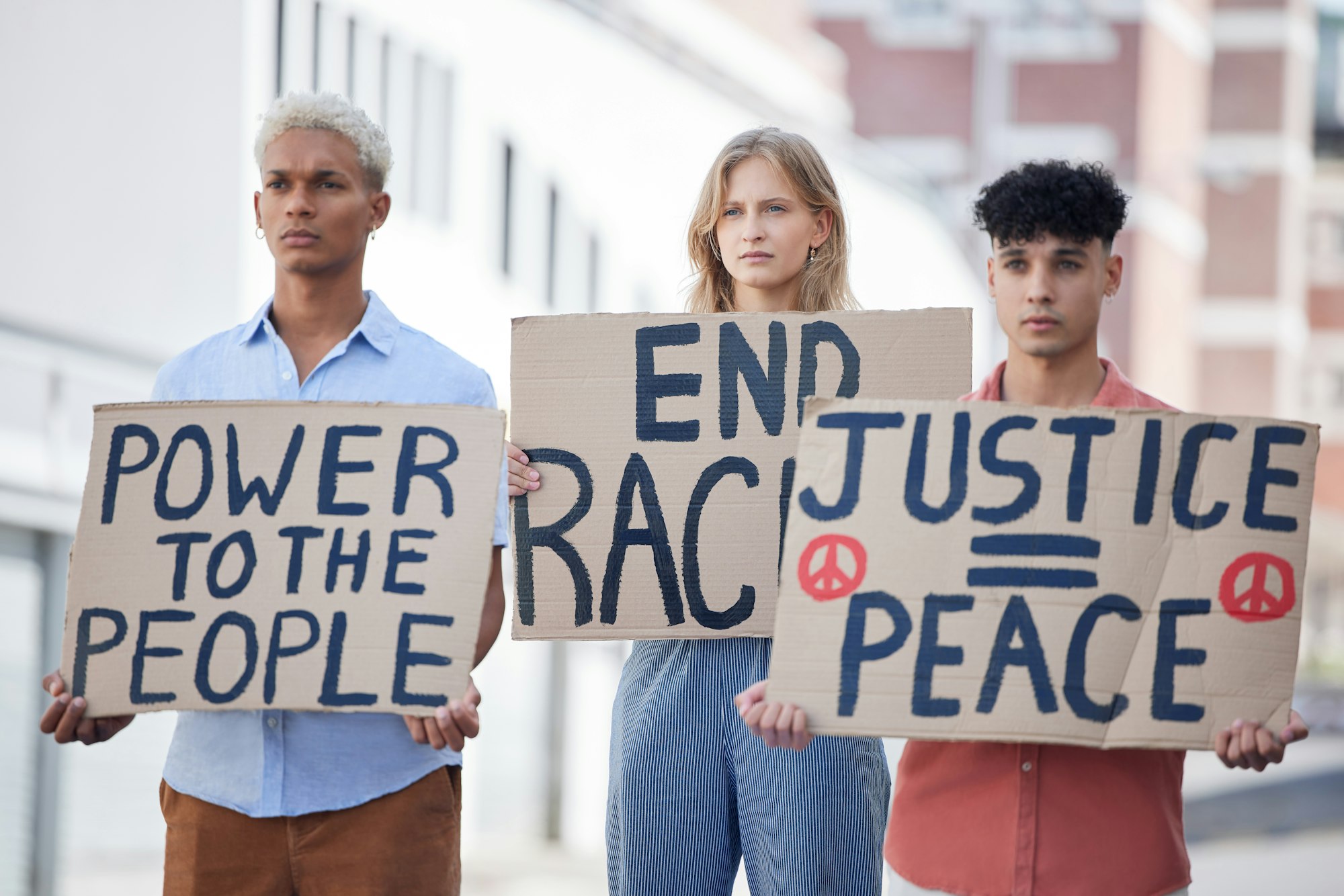 Protest, crowd and poster of peace, racism and justice in city street rally, fight and human rights